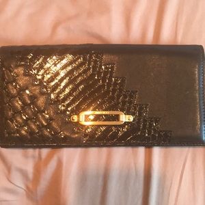 Jimmy Choo black leather/snakeskin clutch